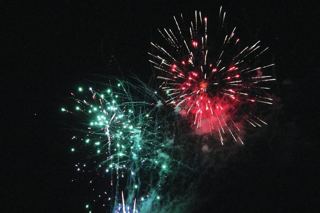 Fireworks explode above the Homer Spit on Dec. 31, 2020 as part of the third annual crowdfunded fireworks in Homer, Alaska. (Photo by Megan Pacer/Homer News)