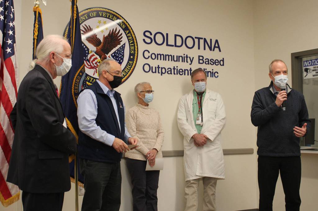 From left, Soldotna Mayor Paul Whitney, Alaska Office of Veterans Affair Director Verdie Bowen, Dr. Teresa Boyd, a doctor and Tom Steinbrunner attend a ribbon cutting ceremony at the Soldotna Community Based Outpatient Clinic on Wednesday, Dec. 29, 2021 in Soldotna, Alaska. (Ashlyn OHara/Peninsula Clarion)