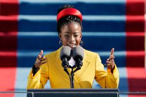 American poet Amanda Gorman reads her commissioned poem The Hill We Climb during the 59th Presidential Inauguration at the U.S. Capitol in Washington on Jan. 20, 2021. (AP Photo / Patrick Semansky, Pool)