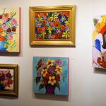 Some of the paintings in Dr. Sami Alis exhibit, The Mind of a Healthcare Worker During the COVID-19 Pandemic, showing in January 2022 at the Homer Council on the Arts in Homer, Alaska. The paintings are displayed chronologically and in the order Ali painted them. This group was from the spring of 2021 when vaccines became widely available. (Photo by Michael Armstrong/Homer News)