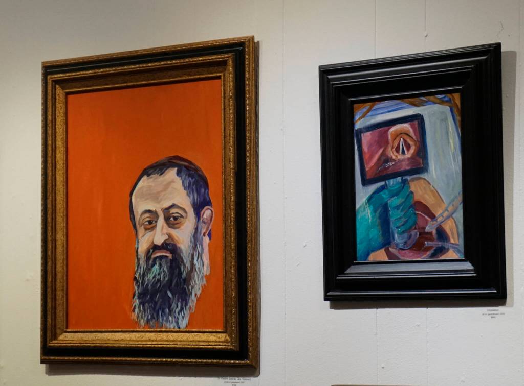 These two paintings are from Dr. Sami Alis exhibit, The Mind of a Healthcare Worker During the COVID-19 Pandemic, showing in January 2022 at the Homer Council on the Arts in Homer, Alaska. (Photo by Michael Armstrong/Homer News)
