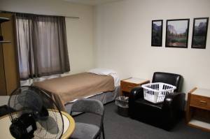 Furniture awaits use in a bedroom at a cold weather shelter set to open next month on Monday, Nov. 22, 2021 in Nikiski, Alaska. (Ashlyn OHara/Peninsula Clarion)