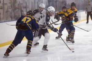 Soldotnas Landon Stonecipher carries the puck against Homer on Friday, Jan. 14, 2022, at Kevin Bell Ice Arena in Homer, Alaska. (Photo by Sarah Knapp/Homer News)
