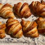 Achieving the crispy, flaky layers of golden goodness of a croissant require precision and skill. (Photo by Tresa Dale/Peninsula Clarion)
