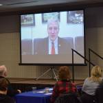 Members of the Kenai and Soldotna chambers of commerce listen to a briefing by Alaska Sen. Dan Sullivan during a joint luncheon at the Soldotna Sports Complex on Tuesday, Jan. 18, 2022. (Camille Botello/Peninsula Clarion)