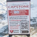 A sign for Capstone Clinic gives people instructions for how to register to view their results. (Photo by Sarah Knapp/Homer News)