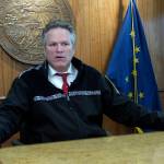 Alaska Gov. Mike Dunleavy speaks with reporters during a news briefing on Tuesday, Sept. 14, 2021, in Juneau, Alaska. Dunleavy said he doesn't see his acceptance of former President Donald Trump's endorsement as hurting his relationship with the state's senior U.S. senator, Republican Lisa Murkowski, who voted to convict Trump at his impeachment trial last year and whom Trump has vowed to fight in her reelection bid. (AP Photo/Becky Bohrer)