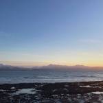 The sun sets over Kachemak Bay as seen from Ocean Drive Loop on Tuesday, Jan. 25. (Photo by Sarah Knapp/Homer News)