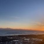 The sun sets over Kachemak Bay as seen from Ocean Drive Loop on Tuesday, Jan. 25. (Photo by Sarah Knapp/Homer News)