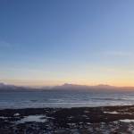 The sun sets over Kachemak Bay as seen from Ocean Drive Loop on Tuesday, Jan. 25. (Photo by Sarah Knapp/Homer News)