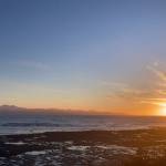 The sun sets over Kachemak Bay as seen from Ocean Drive Loop on Tuesday, Jan. 25. (Photo by Sarah Knapp/Homer News)