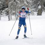 Jeff Helminiak/Peninsula Clarion 
Homers Jody Goodrich skates to seventh in the varsity race at the Kardinal Klassic at Kenai Golf Course on Friday in Kenai.