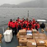 Courtesy photo / USCG
The crew of the Coast Guard Cutter Anacapa pose with the donated goods they ferried from Petersburg as they prepare to offload them in Wrangell.