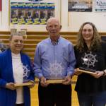Anita Harry, Merlin Cordes and Corise Story were inducted into the Alaska School Activities Association Hall of Fame Friday night during the Sons of the American Legion Homer Winter Carnival basketball tournament. (Photo by Sarah Knapp/Homer News)