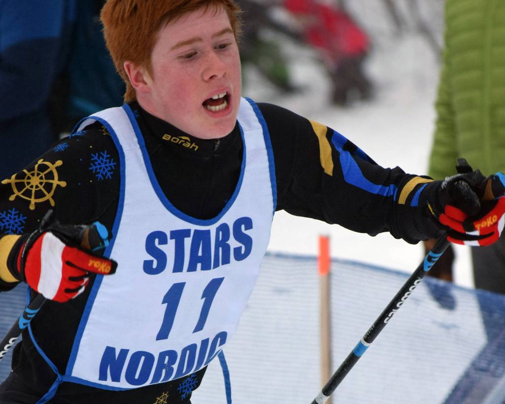 Homer's Jody Goodrich finishes the boys 7.5-kilometer classic mass start Saturday, Feb. 12, 2022, at the Region III ski championshps at Tsalteshi Trails just outside of Soldotna, Alaska. (Photo by Camille Botello/Peninsula Clarion)