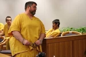 AP Photo / Mark Thiessen
Steven Downs leaves a courtroom following his arraignment, on Tuesday, Aug. 6, 2019, in Anchorage, Alaska. A jury in Alaska on Thursday, Feb. 10, 2022, found Downs guilty of the killing and rape of a woman at the University of Alaska Fairbanks that went unsolved for more than two decades.