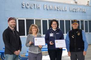 South Peninsula Hospital Laboratory Director Laura Miller, second from left, and SPH Director of Marketing and Public Relations Derotha Ferraro, second from right, were honored by the Rotary Club of Homer-Kachemak Bay on Thursday, Feb. 17, at South Peninsula Hospital in Homer, Alaska, for their contributions to the health of southern Kenai Peninsula communities. Presenting the awards were Bernie Griffard, club president, far right, and Van Hawkins, co-chair of the annual Rotary Health Fair. (Photo by Michael Armstrong/Homer News)