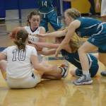 Lady Mariner Kaylin Anderson keeps the ball away from the Lady Bulldogs during Senior Night on Friday, Feb. 25, 2022, at the Alice Witte Gym at Homer High School in Homer, Alaska. (Photo by Michael Armstrong/Homer News)