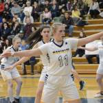 Lady Mariner Sydney Shelby and her teammates put up a defense against the Lady Bulldogs during Senior Night on Friday, Feb. 25, 2022, at the Alice Witte Gym at Homer High School in Homer, Alaska. Behind Shelby are, from left to right, Mel Morris, Hannah Stonorov, Delilah Harris, and Bethany Engebretsen. (Photo by Michael Armstrong/Homer News)