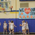 The Lady Mariners warm up in a game against the Nikiski Bulldogs during Senior Night on Friday, Feb. 25, 2022, at the Alice Witte Gym at Homer High School in Homer, Alaska. (Photo by Michael Armstrong/Homer News)