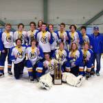 The Glacier Kings 18MU hockey team pose for a photo after winning the state championship on Monday, March 14, 2022, at the MTA Events Center in Wasilla, Alaska. In the back row, from left to right, are Aiden Arno, Brock Barth, Casey Otis, Hunter Green, Matfey Reutov, Seamus Hatton, Makary Reutov, River Henry, Walden Kraszeski, Coach Chris Owen, Coach Joanna Owen. In the front row, from left to right, are Micah Williamson, Kazden Stineff, Goalie Keegan Strong, Owen Pitzman, Jordan Barrowcliff and Ethan Drake. (Photo by Stephanie Pitzman)