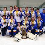 The Glacier Kings 18MU hockey team pose for a photo after winning the state championship on Monday, March 14, 2022, at the MTA Events Center in Wasilla, Alaska. In the back row, from left to right, are Aiden Arno, Brock Barth, Casey Otis, Hunter Green, Matfey Reutov, Seamus Hatton, Makary Reutov, River Henry, Walden Kraszeski, Coach Chris Owen, Coach Joanna Owen. In the front row, from left to right, are Micah Williamson, Kazden Stineff, Goalie Keegan Strong, Owen Pitzman, Jordan Barrowcliff and Ethan Drake. (Photo by Stephanie Pitzman)