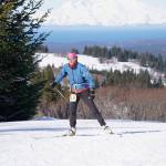Julie Truskowski of Anchorage makes her way up a hill on Diamond Ridge while competing in the 25-km Kachemak Marathon on Saturday, March 19, 2022, in Homer, Alaska. (Photo by Michael Armstrong/Homer News)