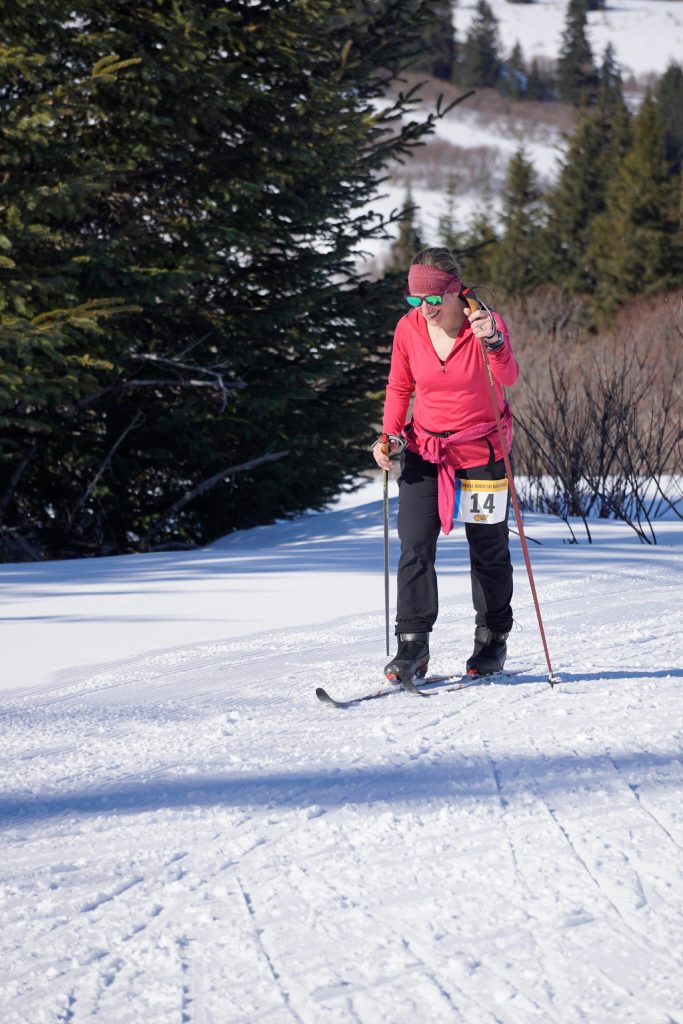 Becky King of Homer makes her way up a hill on Diamond Ridge while competing in the 42-km Kachemak Marathon on Saturday, March 19, 2022, in Homer, Alaska. (Photo by Michael Armstrong/Homer News)