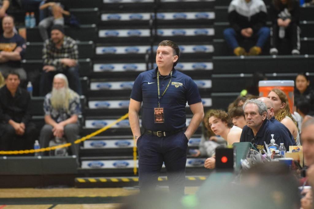 Nick Finley coaches the Ninilchik Wolverines during the 2A state basketball championship game at the Alaska Airlines Center in Anchorage, Alaska on Saturday, March 19, 2022. (Camille Botello/Peninsula Clarion)