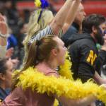 Ninilchik fans cheer on the Wolverines during the Class 2A state basketball championship game at the Alaska Airlines Center in Anchorage, Alaska, on Saturday, March 19, 2022. (Camille Botello/Peninsula Clarion)