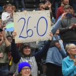 Ninilchik fans cheer on the Wolverines during the Class 2A state basketball championship game at the Alaska Airlines Center in Anchorage, Alaska, on Saturday, March 19, 2022. (Camille Botello/Peninsula Clarion)