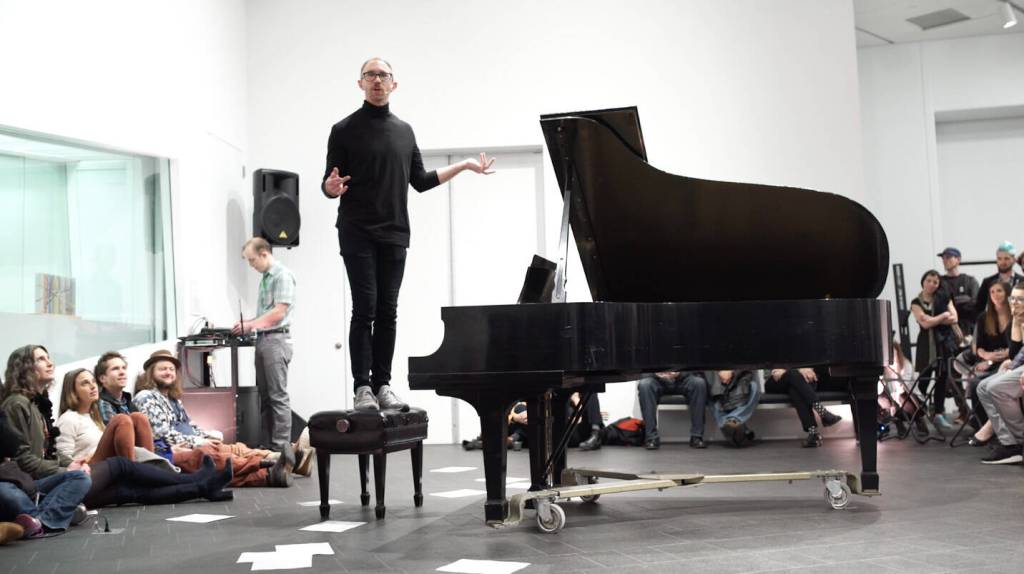 Mutlidisciplinary artist Nathan Hall speaks Friday, April 1, 2022, at Bunnell Street Arts Center in Homer, Alaska, for the start of his residency. (Photo provided)