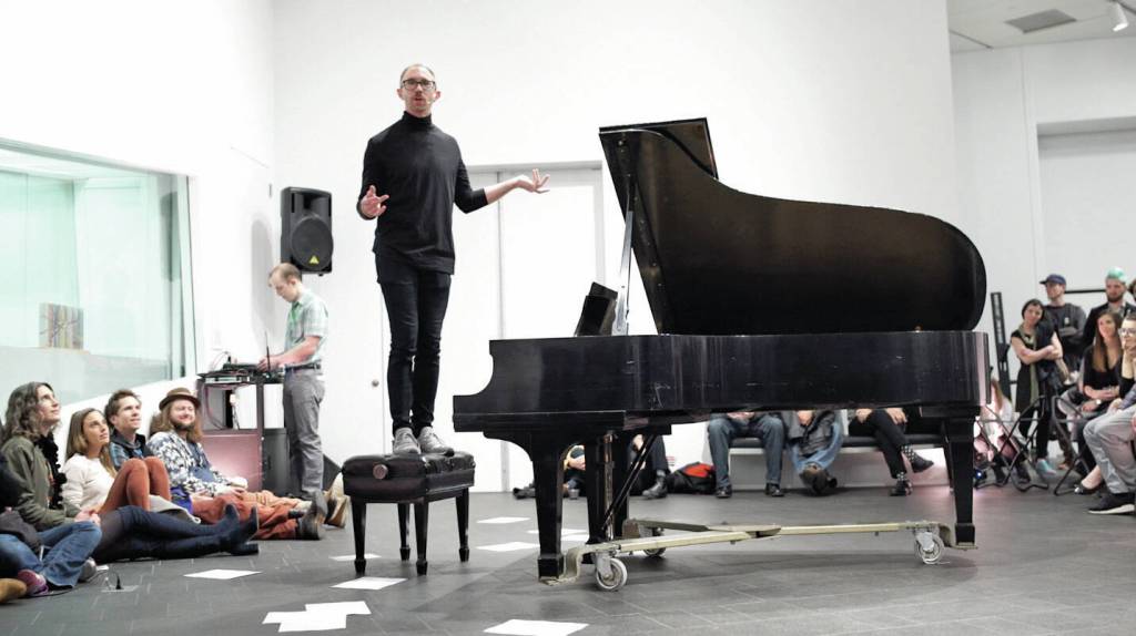 Mutlidisciplinary artist Nathan Hall speaks Friday, April 1, 2022, at Bunnell Street Arts Center in Homer, Alaska, for the start of his residency. (Photo provided)