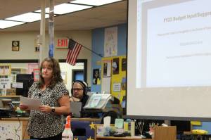 KPBSD Finance Director Elizabeth Hayes (left) gives a presentation on the school districts FY23 budget at Soldotna High School on Thursday, Oct. 8, 2021 in Soldotna, Alaska. (Ashlyn OHara/Peninsula Clarion)