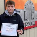 February Homer Flex School Phoenix Award winner Caleb Browning poses for a photo at Flex on March 30, 2022, in Homer, Alaska. (Photo by Elizabeth Schneider)