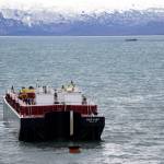 The Alan G with C & C Diving and Salvage tows the Cook Inlet Spill Prevention and Response Inc. barge Redoubt away from the Mud Bay beach in Kachemak Bay off Kachemak Drive at about 2:20 p.m. Thursday, March 31, 2022, in Homer, Alaska. (Photo by Michael Armstrong/Homer News)