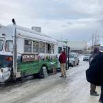 People wait in line for Mochileros Guatemalan street food in Anchorage, Alaska, on March 18, 2022. (Camille Botello/Peninsula Clarion)