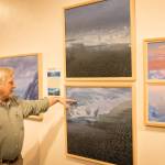 David Rosenthal describes work from his travels around the Arctic Ocean and through the Northwest Passage from his show, "Painting at the Edge of the Ice Age," at the Pratt Museum & Park in Homer, Alaska. (Photo by Sean McDermott)