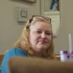 Joanna Samson-Sills works at the Freedom House in Soldotna, Alaska, on Monday, April 4, 2022. (Camille Botello/Peninsula Clarion)