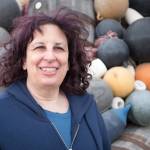 Screenwriter Karen Frank poses for a portrait outside of Bunnell Street Arts Center in Homer, Alaska. (Photo by Sean McDermott)