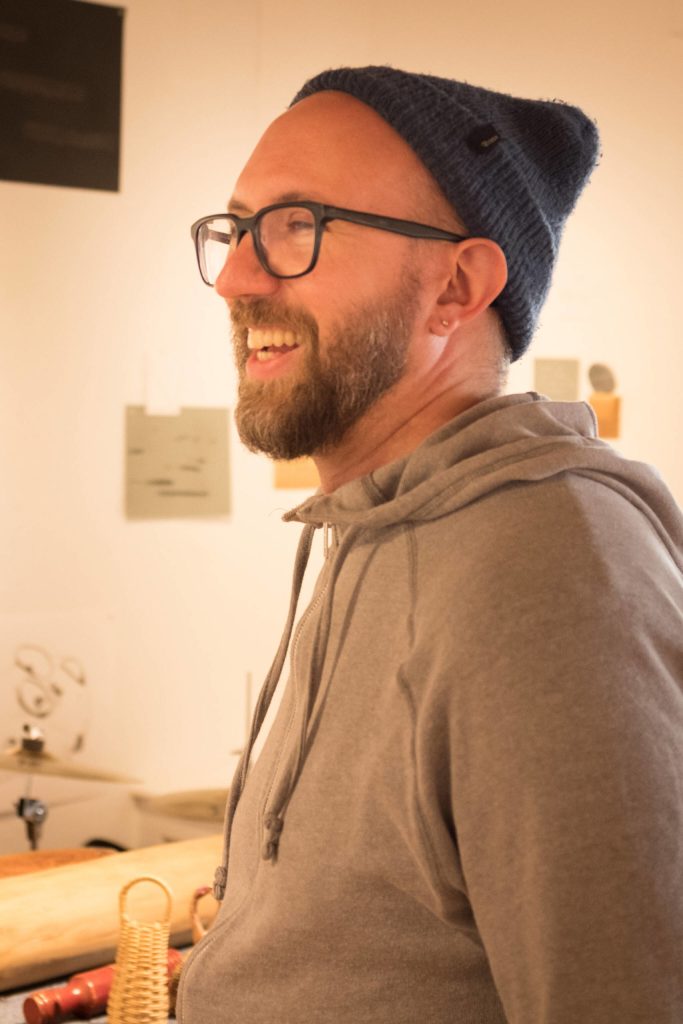 Composer Nathan Hall listens to a practice session with other musicians before his Friday, April 15, 2002, Bunnell Arts by Air performance at Bunnell Street Arts Center in Homer, Alaska. (Photo by Sean McDermott)