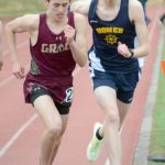 Homers Seamus McDonough, right, starts the 1,600-meter event on Saturday, April 23, 2022, for the Homer Invite at Homer High School in Homer, Alaska. (Photo by Michael Armstrong/Homer News)