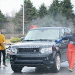 Members of the Homer Mariner baseball team wash cars for a fundraiser on Saturday, April 23, 2022, at Wells Fargo in Homer, Alaska. The Mariners play Friday vs. Redington High School in Wasila and Saturday vs. Barlett and Service in Anchorage. (Photo by Michael Armstrong/Homer News)