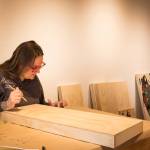 Artist Amber Webb starts works on a new drawing at Bunnell Street Arts Center. Her work will be on display at the gallery through the month of May. (Photo by Sean McDermott)