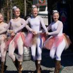 Members of Breezy Berrymans dance troupe make an appearance for the Homer Brewing Companys bird calling contest during the Kachemak Bay Shorebird Festival on Saturday, May 7, 2022, in Homer, Alaska. The troupe performed The Ballet of the Birds earlier that day and later that evening at the Lands End Quarterdeck. From left to right are Christina Platter, Ireland Styvar, Reilly-Sue Baker and Natalia Sherwood. (Photo by Michael Armstrong/Homer News)