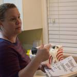 Christina Burns, librarian for the Kenai Peninsula Borough School District, packs food for the day at her home in Anchorage, Alaska, around 4 a.m. on Tuesday, May 3, 2022. (Camille Botello/Peninsula Clarion)