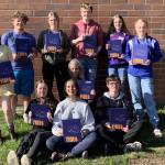 The Homer High School Mariner Logbook staff pose with the 2022 edition at Homer High School in Homer, Alaska. In the back row from left to right are Courtney Rider, Kamdyn Doughty, Bethany Engebretsen, Tyson Walker, Ally High and Charlotte Fraley. In the front row from left to right are  Kapitolina Reutov, Mariah McGuire (editor), Suzanne Bishop (advisor) and Damon Weisser. (Photo provided)