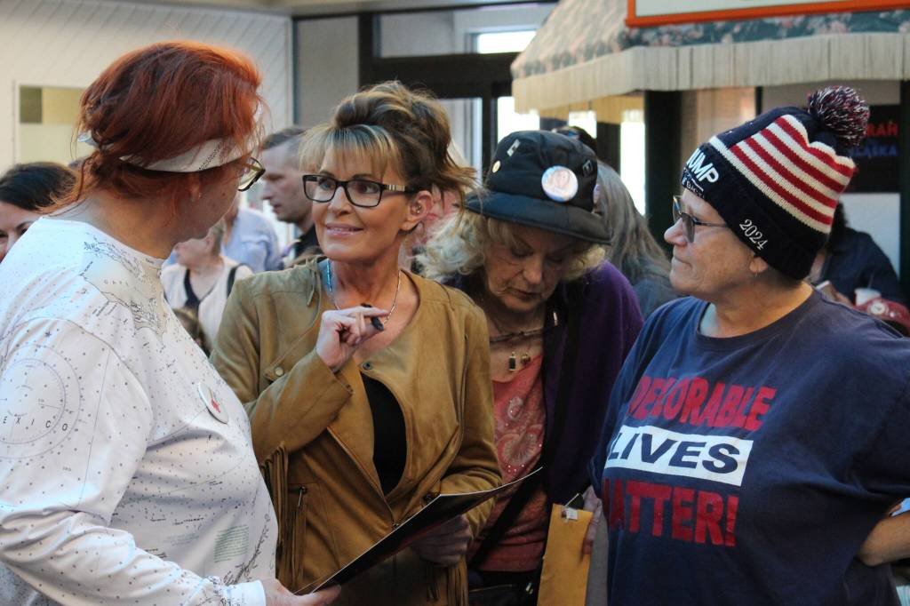 Former Alaska governor and current congressional hopeful Sarah Palin speaks with attendees at a meet-and-greet event outside Gingers Restaurant on Saturday, May 14, 2022, in Soldotna, Alaska. (Ashlyn OHara/Peninsula Clarion)
