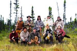 The 10 participants in season 9 of "Alone," premiering on May 26, 2022, on the History Channel. Terry Burns of Homer is the third from left, back. Another Alaskan in the series, Jacques Tourcotte of Juneau, is the fourth from left, back. (Photo by Brendan George Ko/History Channel)