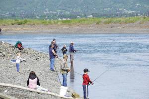 Fishermen young and old try their luck at the Nick Dudiak Fishing Lagoon on June 4, 2020, on the Homer Spit in Homer, Alaska. (Photo by Michael Armstrong/Homer News)